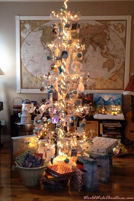Silver metal christmas tree with throwback photos (Canada)